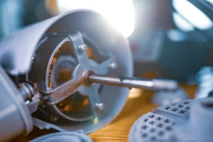 close-up-of-iron-motor-from-home-cooling-fan-lies